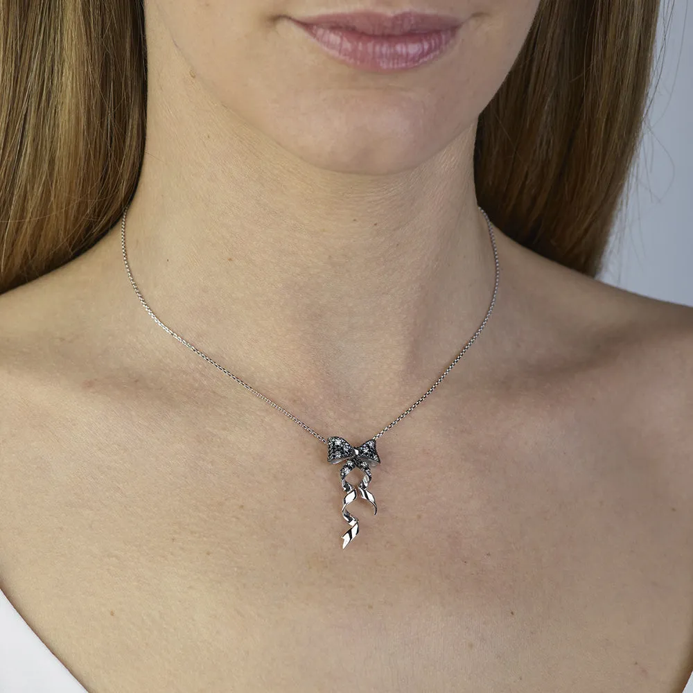 Sinico Dance fiocco collana oro bianco zirconia neri bianchi