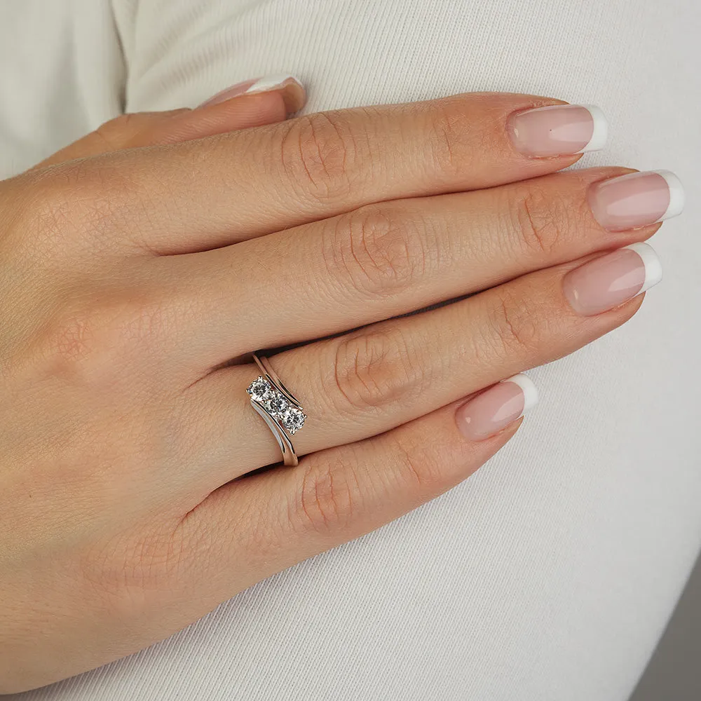 Sinico Trilogy anello onda oro bianco zirconia